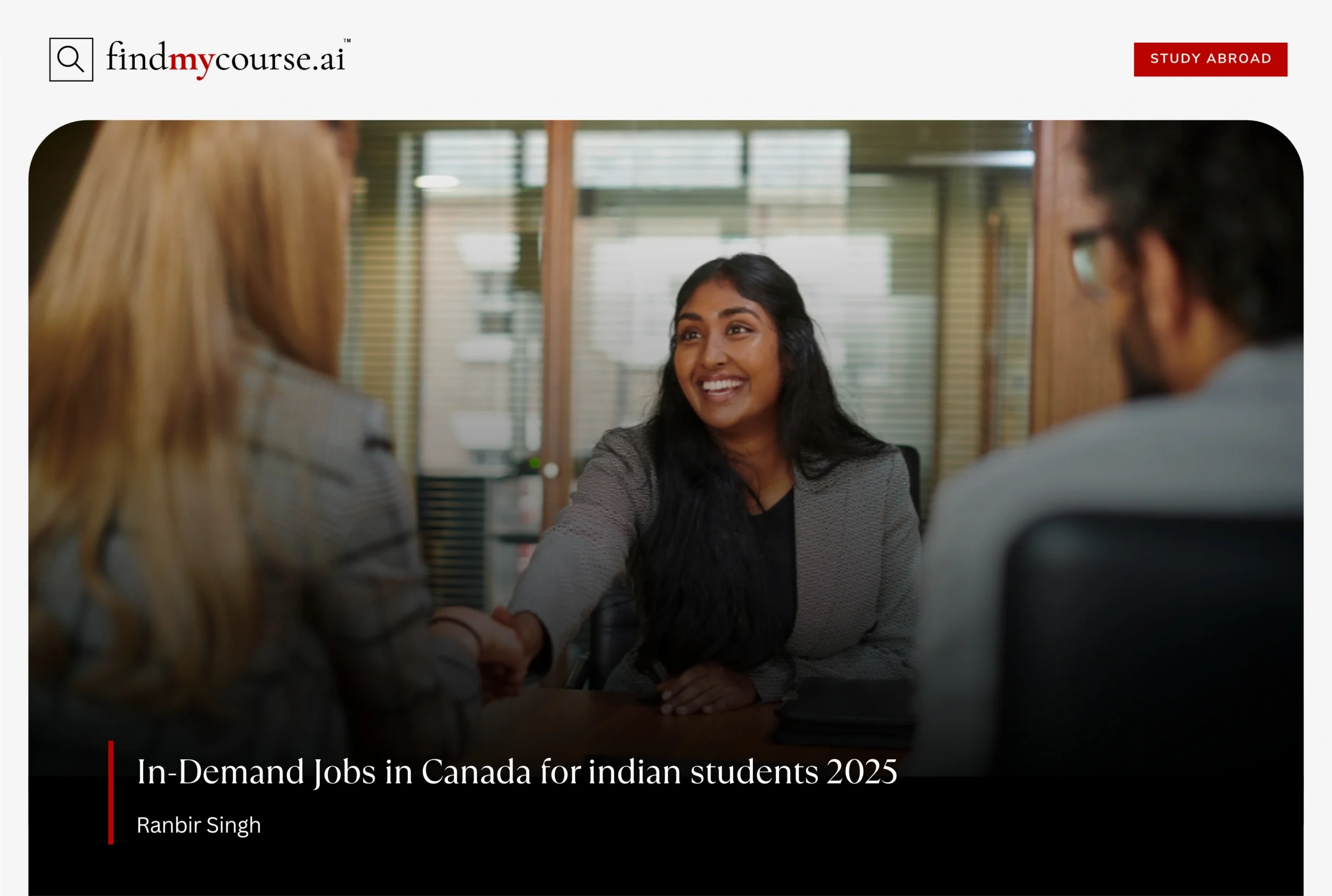 Smiling Indian student shaking hands at an interview for jobs in Canada- Find my course | FindMyCourse.ai